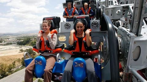 Six Flags shuts down X2 rollercoaster after hundreds allege brain injuries