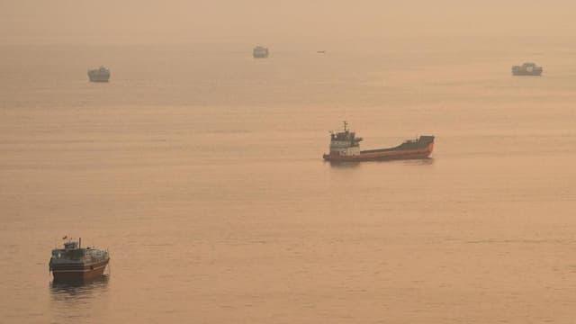 Container ship hit by projectile sinks in Strait of Hormuz, Singapore says
