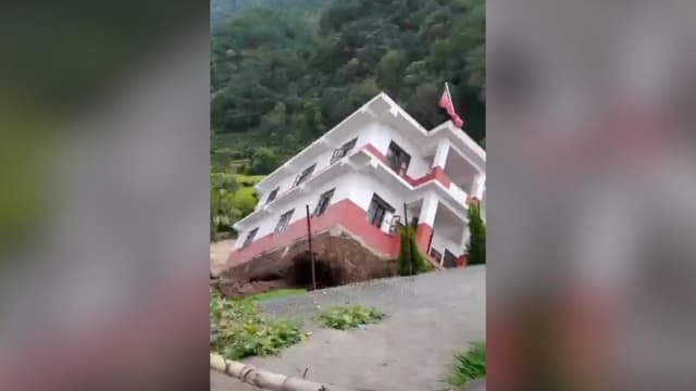 Watch: Moment a government building collapses into a river in Nepal amid floods