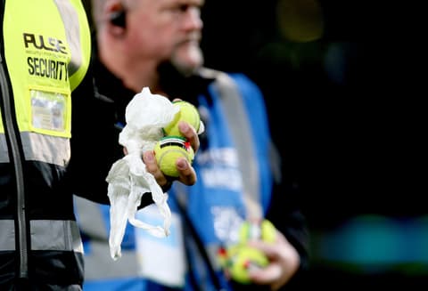 Protesters throw tennis balls, urge Ireland to boycott Israel match