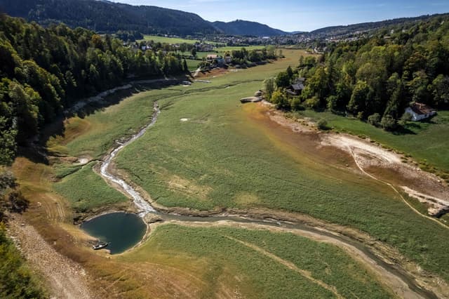 France-Switzerland lake dries up after record-hot summer