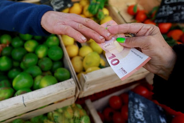 Euro slides to lowest in 17 months amid concerns about French debt