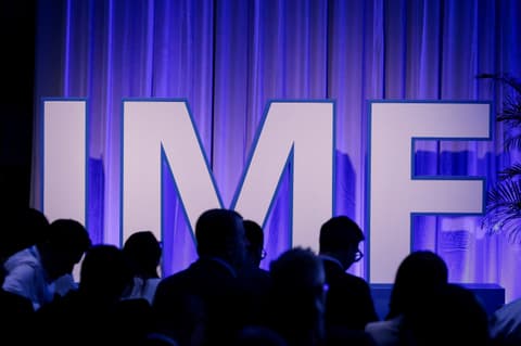 IMF lifts global growth forecast, warns of AI boom, debt risks