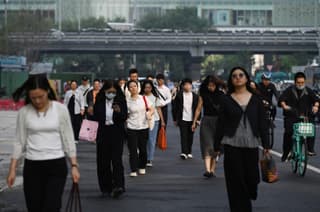 China's jobless fake work routines to keep families calm