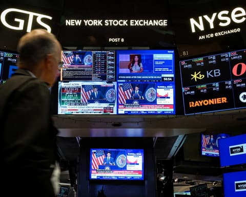S&P 500 and Nasdaq surge to record highs after AI chipmaker rally