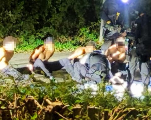 Five men arrested at RAF Fairford are all UK nationals from London, say police