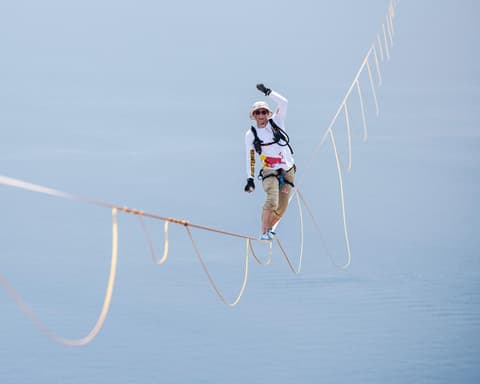 Daredevil Jaan Roose prepares to walk slackline high above central Seoul