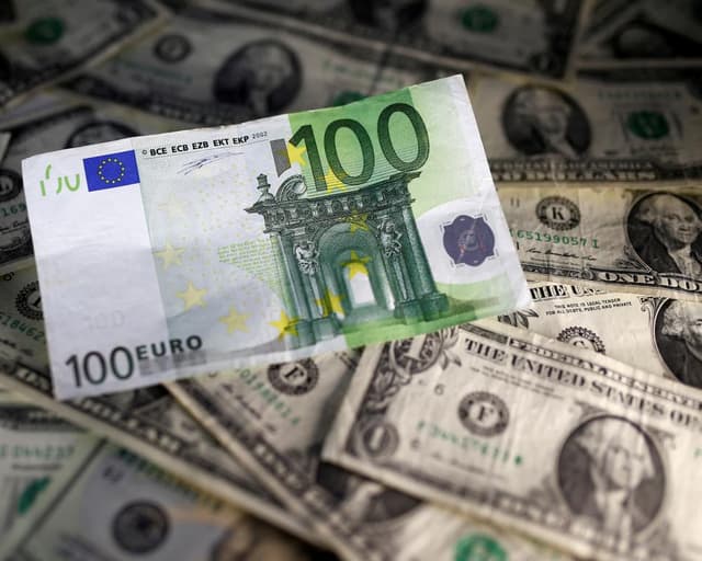 Euro falls to 17-month low against dollar amid French debt fears
