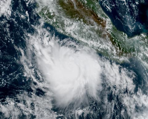 Hurricane Polo, rapidly intensifying from strong El Niño patterns, rages off coast of Mexico