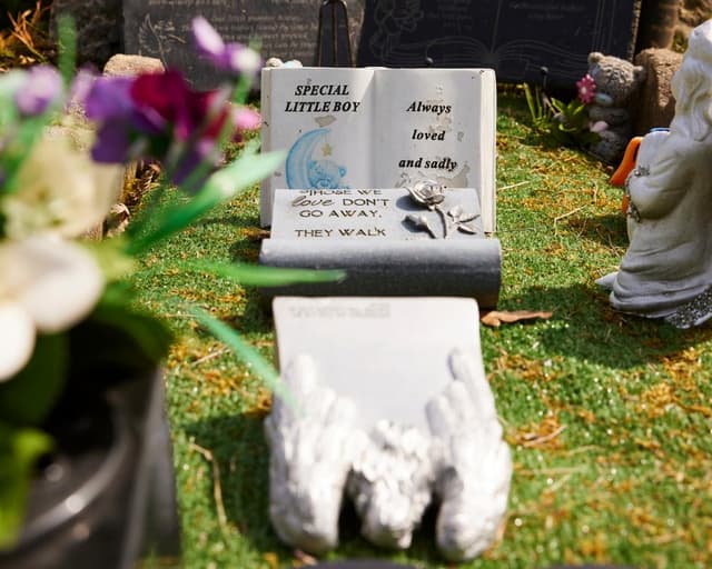 UK government apologises for past burials of stillborn babies in mass graves
