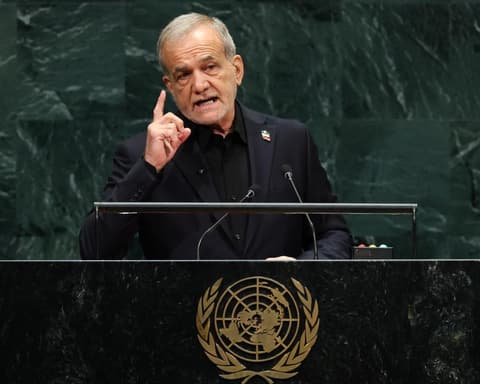 Iran’s president hits out at ‘bully’ Trump in UN speech but signals willingness to talk