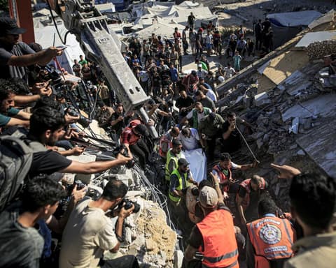 At least 12 killed after building in Gaza City damaged by Israeli strikes collapses