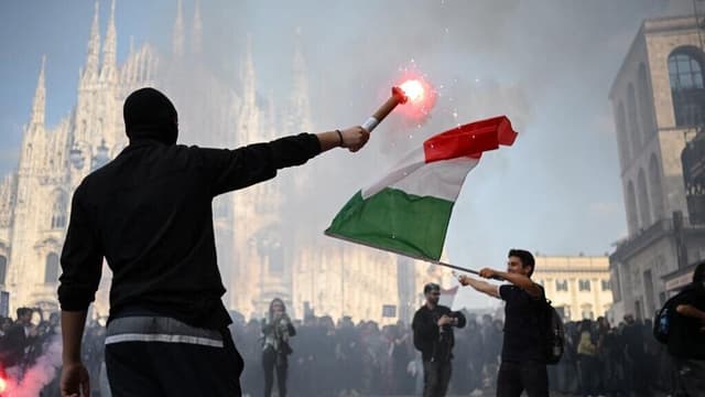 Italy sends troops, toughens security laws after Milan clashes