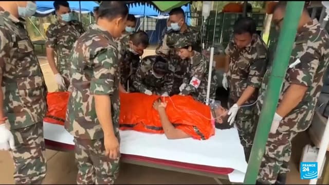 Nepal floods: Two workers pulled alive from tunnel after nine days
