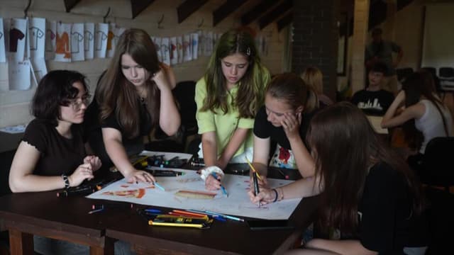 In Ukraine, teens try to heal from trauma of war at summer camp