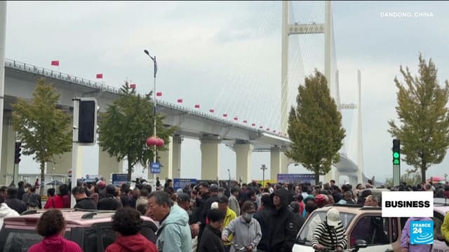 China, North Korea open long-delayed trade bridge