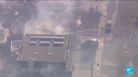 Coastal homes burn as hot winds fuel California fires