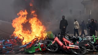 Live: Paris bans protests after violent unrest as Macron takes swipe at Trump