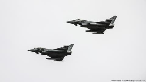 Ukraine apologizes after a suspected drone crashes in Lithuania, damaging a moving car.