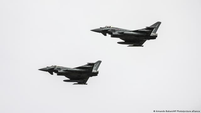 Ukraine apologizes after a suspected drone crashes in Lithuania, damaging a moving car.