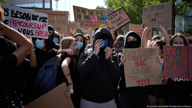 Hundreds of French schools shut, teen loses hand in protests