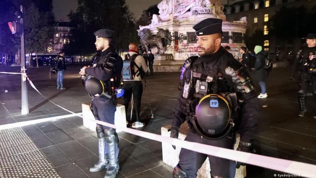 France bans protests in parts of Paris as Macron slams Trump