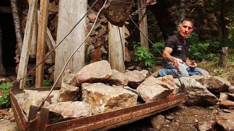 At 15, Jim Bishop bought 2.5 acres for $450; he spent 50 years building a castle that is world's largest one-man project
