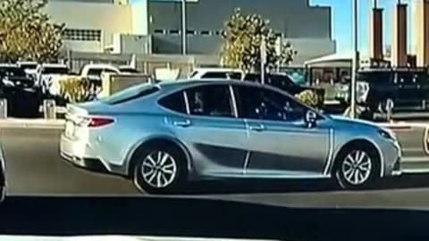 Crossing Guard Shields Family: Las Vegas worker steps between car and children; dashcam video goes viral