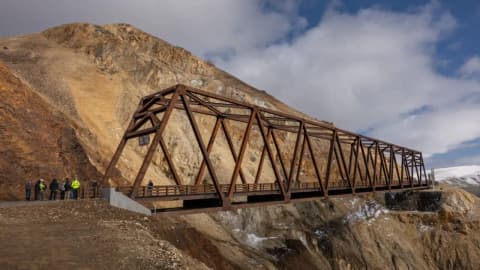 A 2021 landslide cut Denali’s only road; five years later, a $230M bridge spans the slope