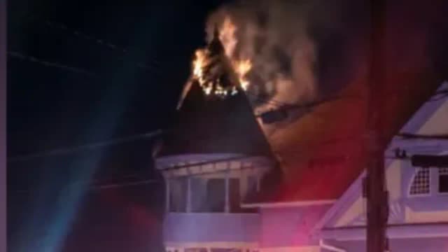 Lightning Damages Mansion Turret: Fire chars historic Maple Street landmark; store below stays open