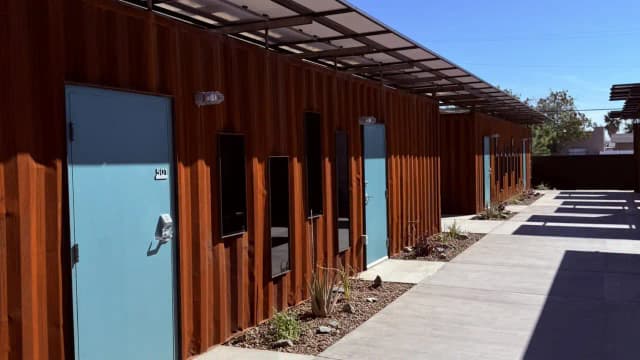 Phoenix turns shipping containers into 40 tiny homes for homeless seniors in a $750,000 project; 56 permanent units next