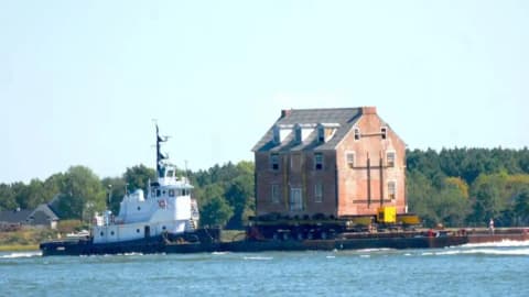 In 2019, a family moved a 255-year-old mansion 50 miles by barge to a new home