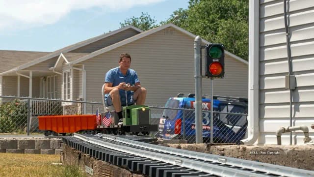 Utah man builds backyard railroad with 40,000 pounds of gravel for $18,000