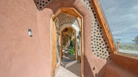 Wyoming couple's tyre-built Earthship listed for $625,000 after 15 years