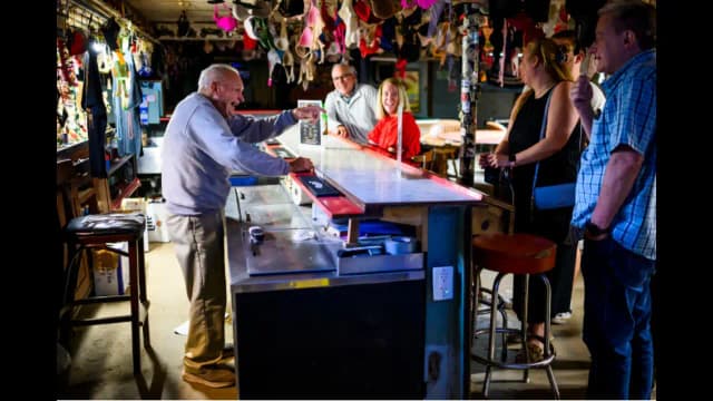 A 103-year-old World War II veteran has been tending the same basement bar in Maryland since 1963
