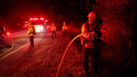 California wildfires spread amid strong winds; over 150,000 customers without power