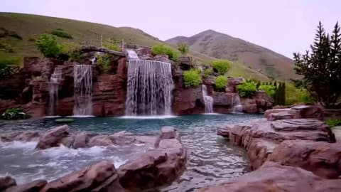 Utah couple built a $2 million backyard pool with a 90-foot mountain and a scuba-diving tunnel