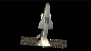 US releases rare image of China's secretive space plane docked to another spacecraft