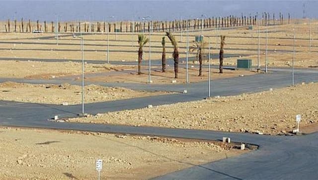 تنسيق حكومي لشمول أسر الشهداء بمبادرة "المليون قطعة أرض"