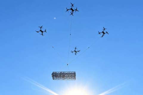 ניסוי מוצלח: ארבעה רחפנים נשאו יחד מטען במשקל 600 ק"ג