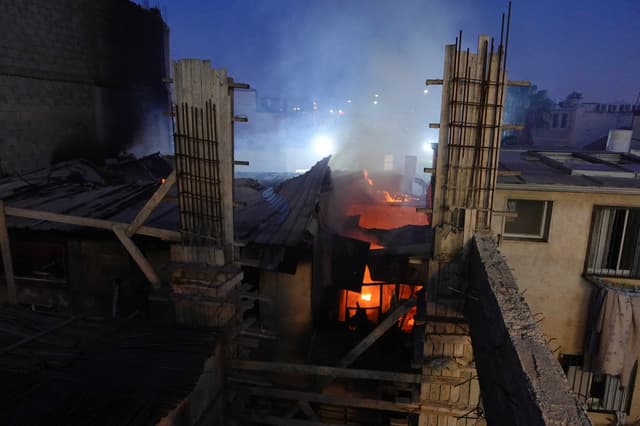 שאלי שרופה באש: גלריה דומעת משריפת בית הכנסת במאה שערים